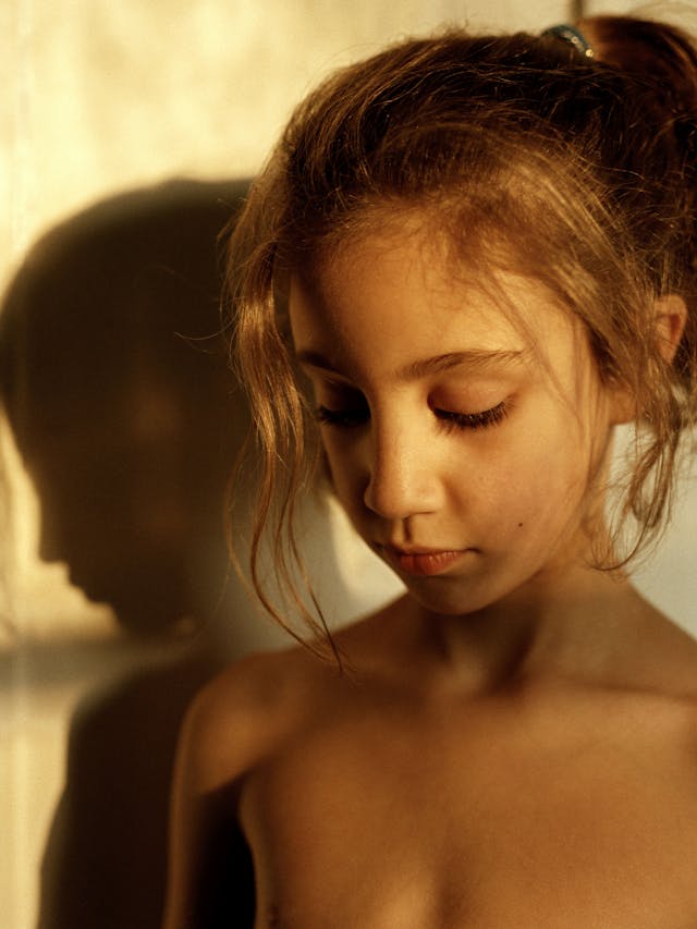 Loving shadows, this portrait of my daughter entered a much large project, 'Woman to Woman' 1990, as part of a triptych.